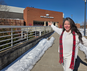 Kerry in front of the Bud Walton Razorbacks Arena