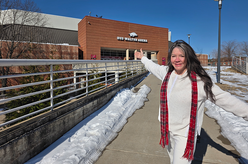 Kerry in front of the Bud Walton Razorbacks Arena