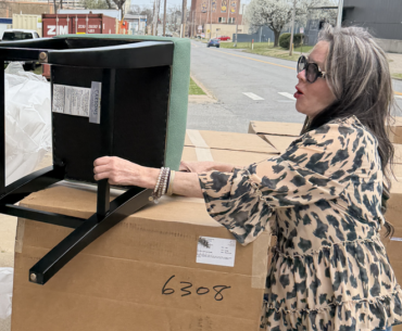 Kerry hard at work unloading barstools