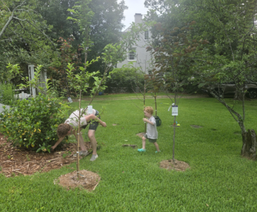 Matt and Arthur tend the yard